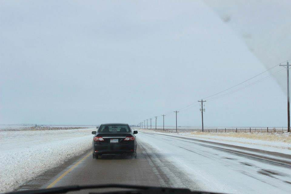 Vehicle driving on icy highway