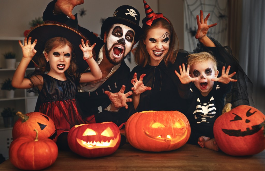 Family in Halloween costumes