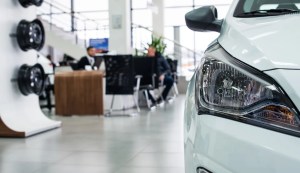Lease car in dealership showroom